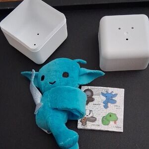 Blue Plush Toy with White Box